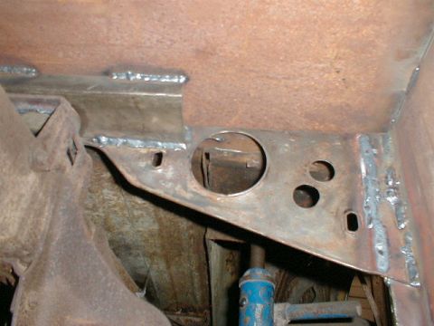 1968 Ford Bronco - Close-up view of a metal underbody component, possibly from a vehicle.