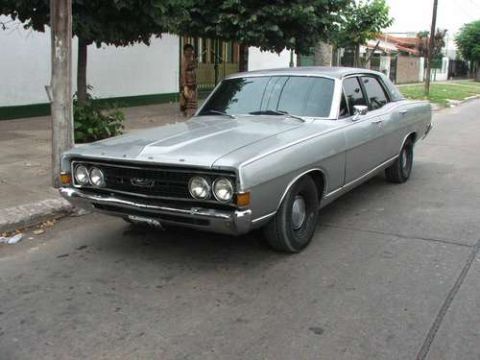 1972 Ford Ranchero - This silver sedan features a distinctive grille and quad headlights, suggesting a 1968 model year.
