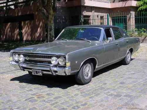 1972 Ford Ranchero - This 1968 Ford Galaxie 500 sedan is parked on a street with a brick building in the background.