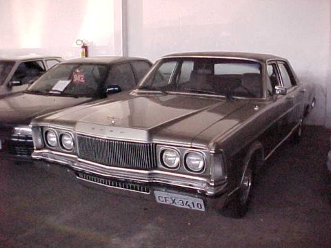 1972 Ford Ranchero - This sedan features a prominent vertical grille and quad headlights, suggesting a 1970s Ford model, but it is not a 1972 Ranchero.