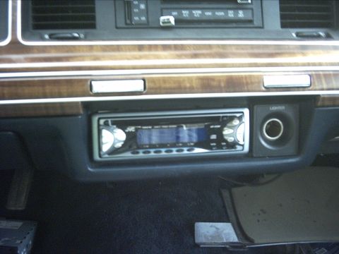 1991 Ford LTD Crown Victoria - Interior view of a 1991 Ford Crown Victoria LTD, an aftermarket JVC stereo system.