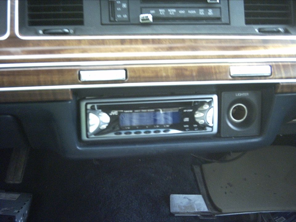 1991 Ford Crown Victoria LTD interior showing dashboard, JVC stereo, and lighter socket