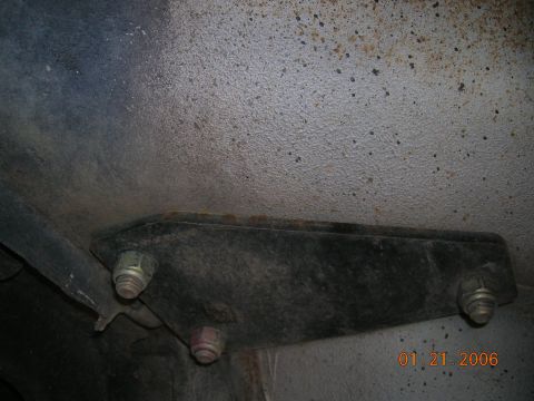1985 Ford Bronco - backing plate mounted under cab.