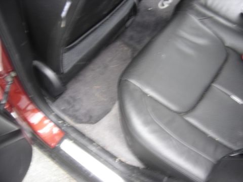 1999 Ford Taurus - Interior view of a car's passenger seat and door panel.