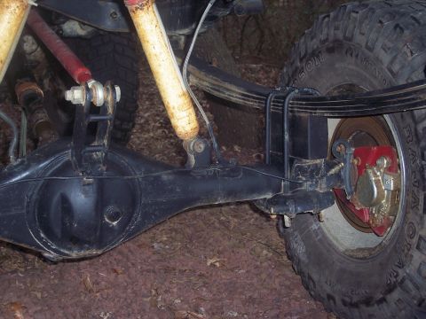 1995 Toyota Tacoma - The rear suspension and axle assembly of a vehicle are shown in detail.