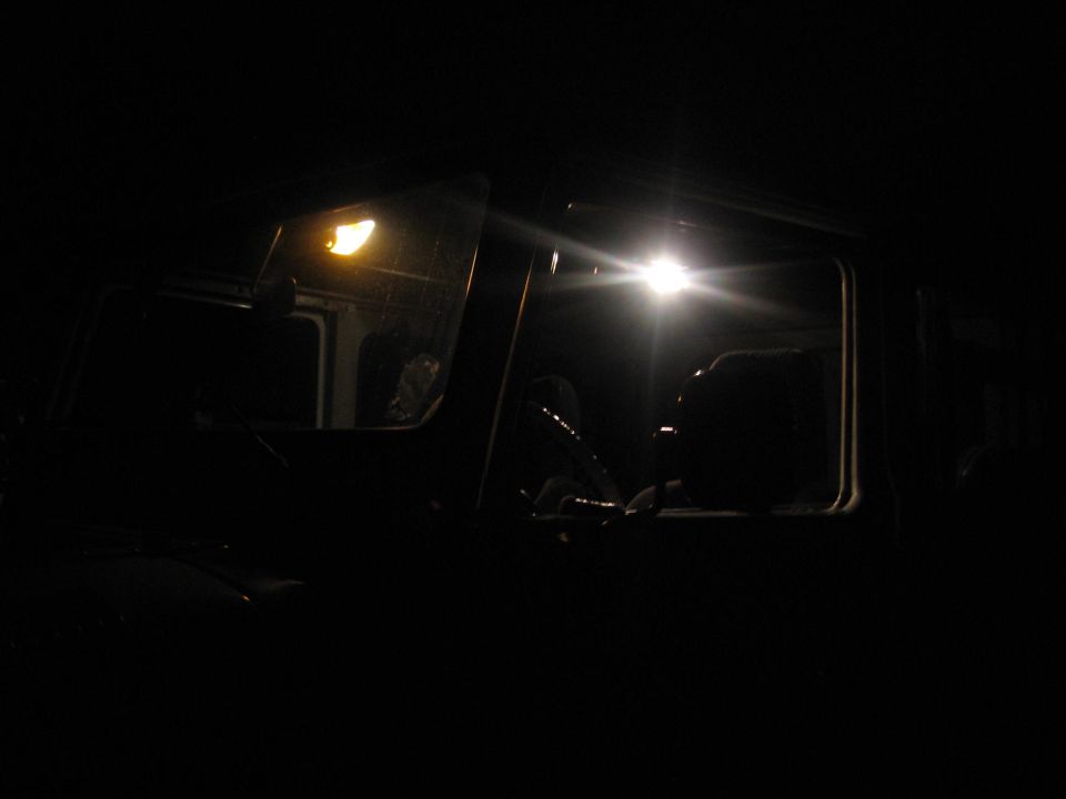 interior of a vehicle at night with lights on