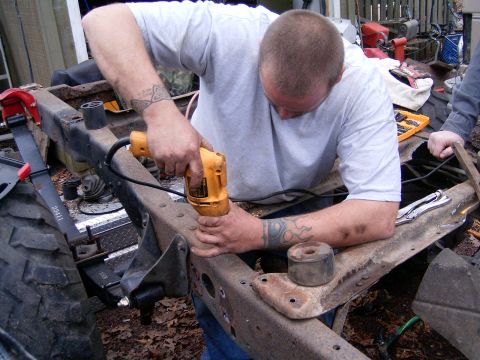 1986 Ford Sport - drilling new cab mount crossmember holes in bronco frame