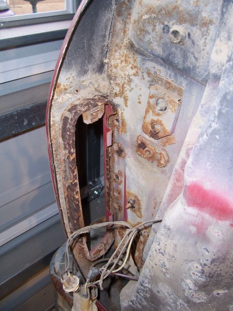 1978 Ford Bronco - Close-up of heavily rusted metal and wiring, possibly a vehicle part.