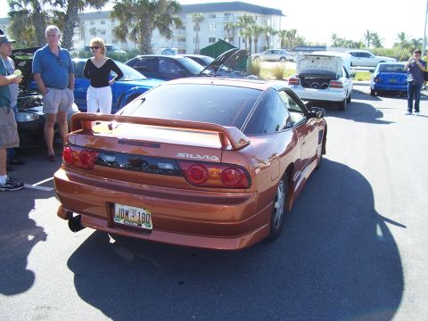 1994 Ford Probe - This Nissan Silvia S13 coupe is seen from the rear at a car meet.