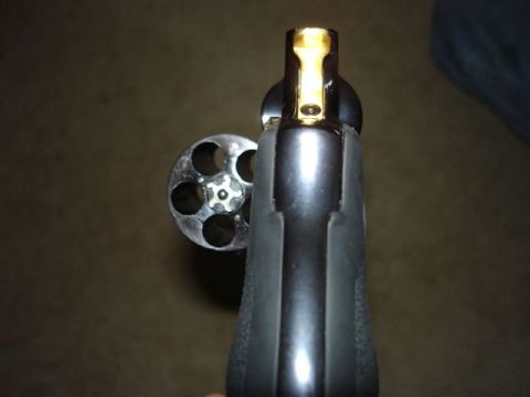 1986 Ford Bronco - The image shows the cylinder and barrel of a revolver, not a vehicle.