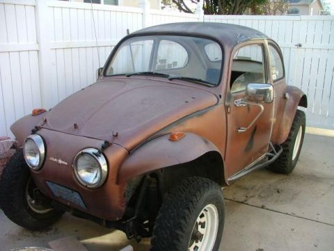 1985 Ford Bronco II - This modified Volkswagen Beetle has been converted into a dune buggy with off-road tires and a roll cage.