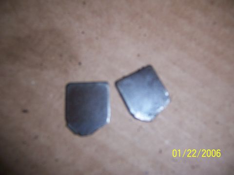 1987 Ford Bronco - Two metal plates are shown on a textured brown surface, with a date stamp of 01/22/2006.