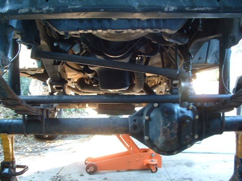 1994 Jeep YJ - Underside view of a 1994 Jeep YJ showing the front axle and suspension system.