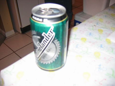 1985 Ford LTD Crown Victoria - A can of Minelander Original beer sits on a table covered with a patterned cloth.
