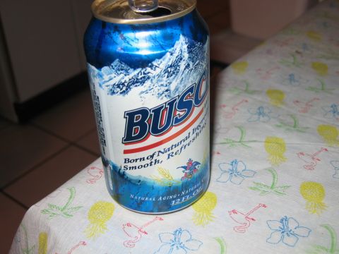 1985 Ford LTD Crown Victoria - A Budweiser beer can sits on a colorful tablecloth.