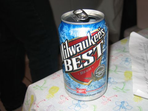 1985 Ford LTD Crown Victoria - A can of Milwaukee's Best beer sits on a table covered with a patterned cloth.