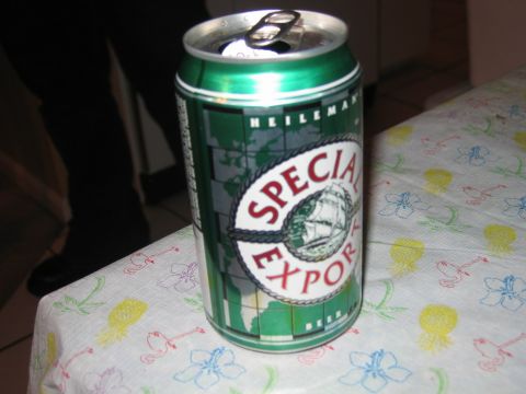 1985 Ford LTD Crown Victoria - A can of Special Export beer sits on a tablecloth with a tropical pattern.