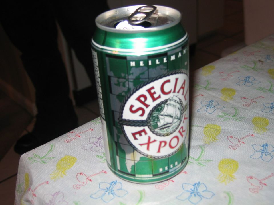 Can of Special Export beer on a patterned tablecloth