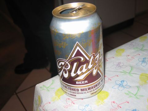 1985 Ford LTD Crown Victoria - A can of Blatz beer sits on a table covered with a colorful, patterned tablecloth.