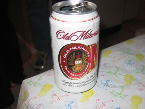 1985 Ford LTD Crown Victoria - An open can of Old Milwaukee beer sits on a patterned tablecloth.