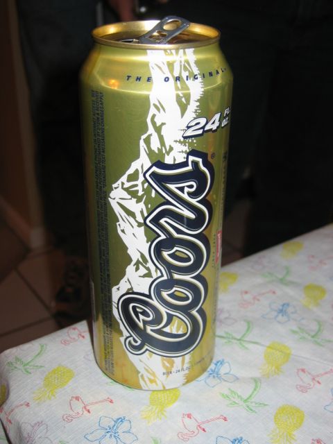 1985 Ford LTD Crown Victoria - A Coors beer can is shown with its mountain graphic and volume information.