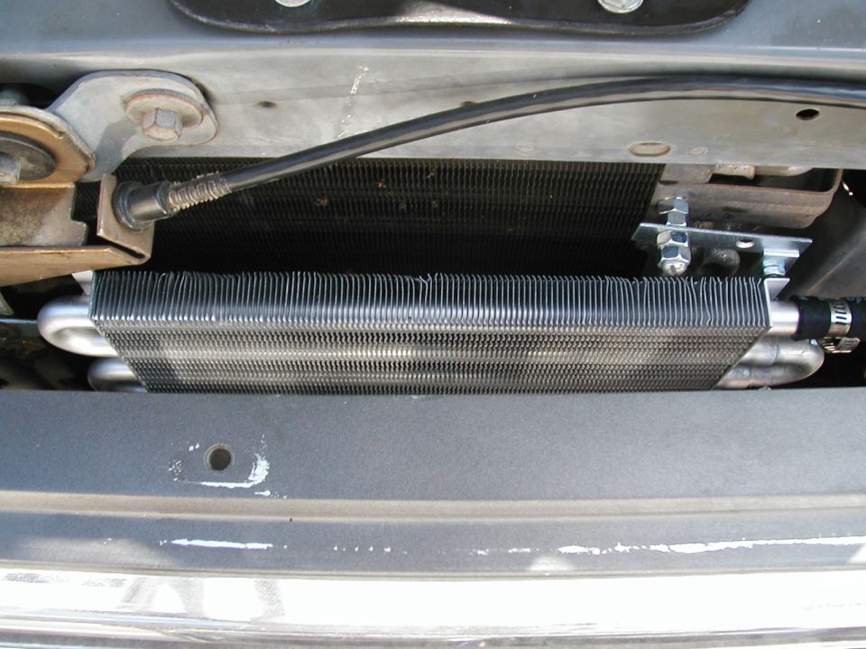 Here it is mounted on the drivers side behind the grill.