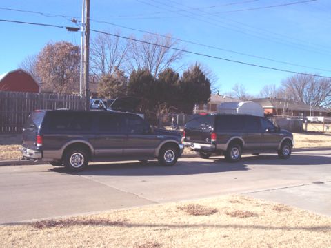 2000 Ford Excursion - My 2000 Limited 2wd Excursion in the rear with Aaron's 2000 Limited 4x4 Excursion in the front