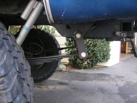 1979 Chevrolet C/K Pickup - Close-up view of the rear suspension system, Bilstein shocks and leaf springs.