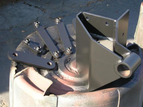 1979 Chevrolet C/K Pickup - Metal truck parts, possibly suspension components, are shown with bolts and welds.
