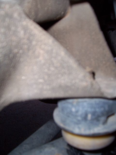 2003 Ford Ranger - Close-up view of a vehicle's suspension system components.