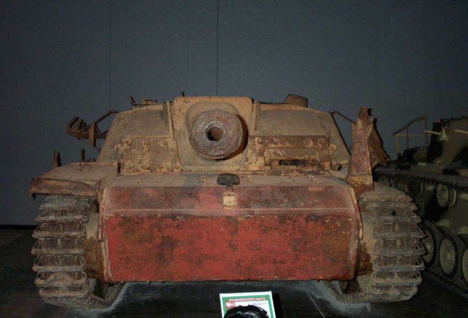 Weathered WWII German tracked assault gun on museum display, front view