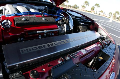 1994 Ford Probe - Close-up of a modified engine bay, with visible racing development branding.