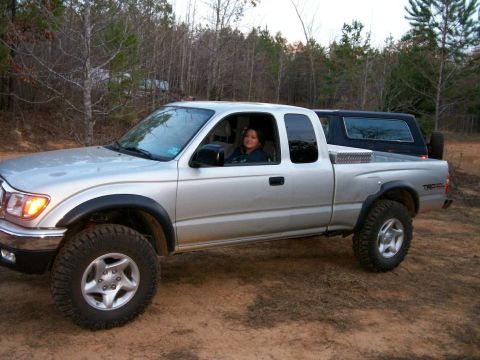 1993 Ford Bronco - My g/f Irma in the 03 Tacoma with the 93 Bronco parked behind it