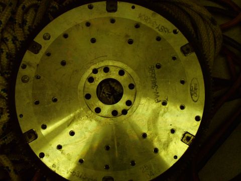 2003 Ford Mustang - A Ford flywheel is shown, part number FW-34U095 and the Ford logo.