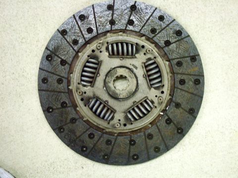 2003 Ford Mustang - A clutch disc is shown, a critical component for manual transmissions.