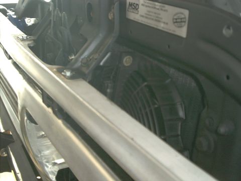 1978 Ford Bronco - Close-up of an engine bay showing a fan and an MSD label.