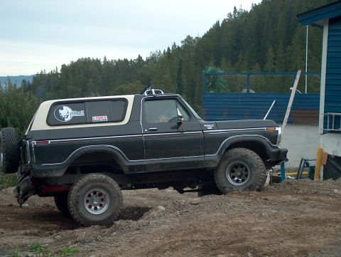 1979 Ford Bronco - This 1979 Ford Bronco is seen from a 3q-front angle, a spare tire mounted on the back.