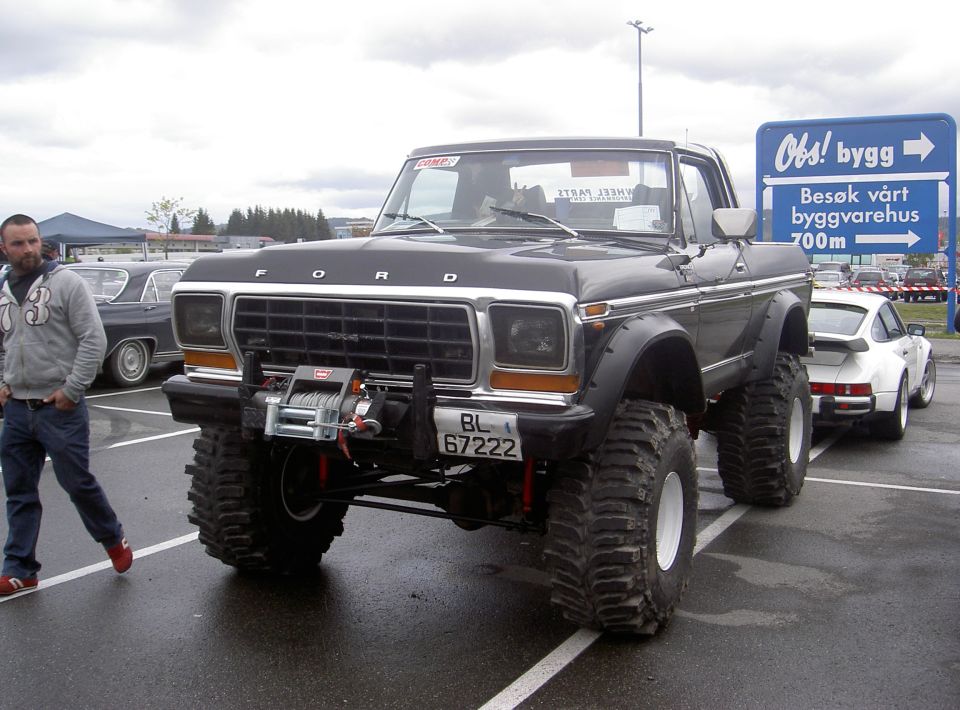 Black 1979 Ford Bronco with winch and oversized tires