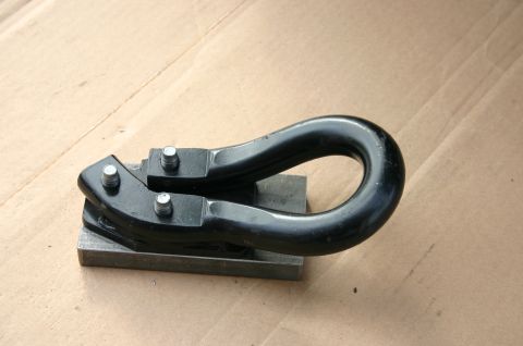 1994 Ford Bronco - A heavy-duty black tow hook is shown mounted on a metal plate, likely for vehicle recovery or towing purposes.