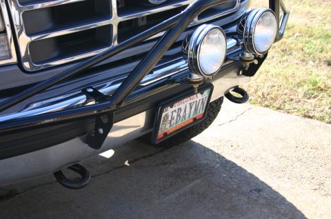1994 Ford Bronco - This truck features a custom brush guard and auxiliary lights mounted on the front bumper.