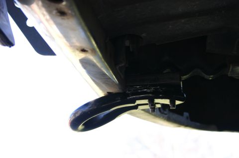 1994 Ford Bronco - A tow hook is visible, attached to the underside of a vehicle.