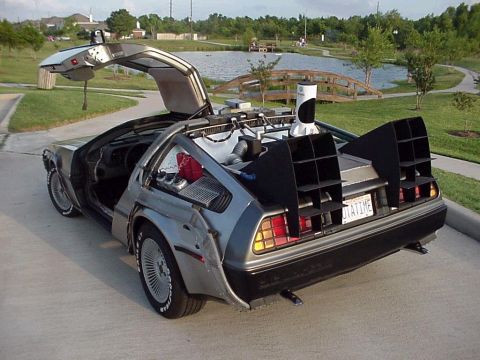 1996 Ford Probe - This DeLorean DMC-12, modified to resemble the time machine from Back to the Future, is shown with its iconic gull-wing doors open.