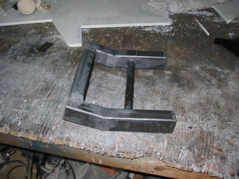 fabricated metal part on a workbench