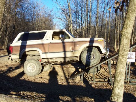 1982 Ford Bronco - Ford Bronco is shown on a ramp during an off-road excursion.