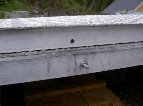1979 Ford Bronco - There is two bolts in front of the rear section and to holes in front of the front section.