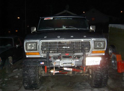 1979 Ford Bronco - Front view of a black 1979 Ford Bronco modified for off-road use.