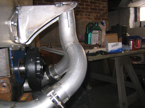 1969 Ford Mustang - Custom turbo plumbing and bracketry are shown, likely for a performance build.