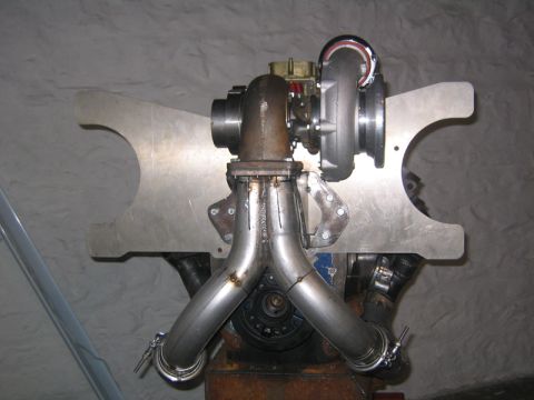 1969 Ford Mustang - Custom turbocharger and exhaust manifold setup, likely for a performance engine build.