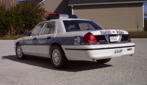 1998 Ford Crown Victoria - Rear view of a 1998 Ford Crown Victoria police car marked 'Norfolk Police'.