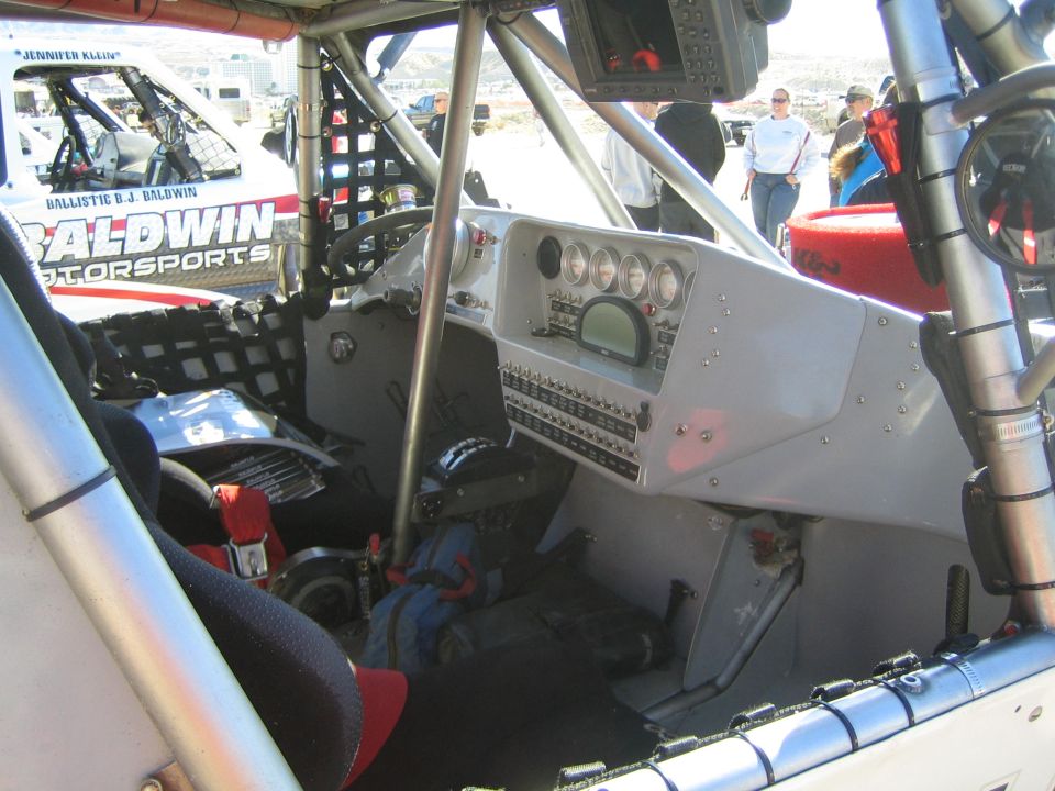 Interior of a Baldwin Motorsports race truck with gauge panel